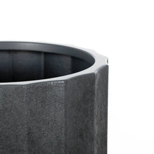 Textured resin planter with flared rim, dark gray finish and round opening