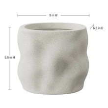 White speckled resin planter with 8 in width and 6.8 in height