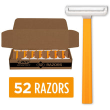 Men's disposable razor set in display box with orange handles and white blade heads