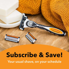 BIC Flex5 razor handle with spare cartridges, orange and black