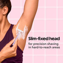 Slim-fixed-head disposable razor shaving an arm, purple handle.