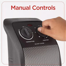 Ceramic tower heater with temperature and function dials on the top panel