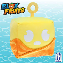 Yellow cube-shaped plush with keyring loop and orange bottom, white face patches