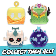 Yellow cube character plush keychain with white eye and mouth details, orange underside