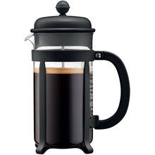 Black glass French press coffee maker with lid, plunger, and black handle.