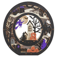 Wooden light-up letter O, dark finish with Halloween cutouts and warm lit center
