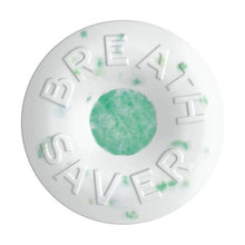 Wintergreen Breath Savers mint tablet disc with green center and embossed text