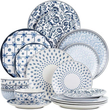 Blue-and-white patterned ceramic dinnerware set, assorted bowls and plates, close-up