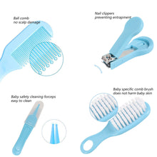 Blue baby grooming tools: ball comb brush, nail clippers, and cleaning forceps