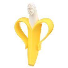 Banana-shaped infant teether toothbrush with yellow silicone handle and white bristle head