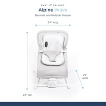 Gray and white bassinet-style bouncer with removable canopy and padded head support.