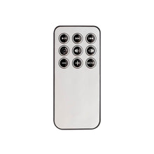Black and silver remote control with buttons for baby bouncer settings.