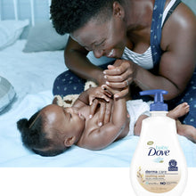 Baby Dove Derma Care soothing wash bottle with blue pump beside parents washing baby