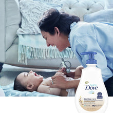 Baby Dove Derma Care soothing wash bottle with blue pump during baby bath