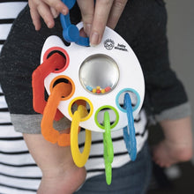 Baby activity ring with colorful clips and a mirror disc