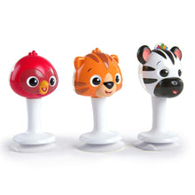Three animal sound toys on white bases: red bird, orange tiger, and zebra