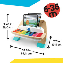 Wooden touch piano baby toy with colorful keys and size diagram