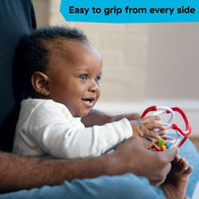 Baby playing with slide & swirl sensory ball toy in red and white with beads