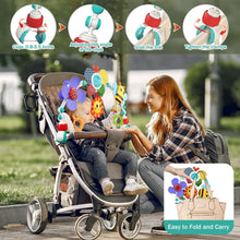 Stroller arch mobile with colorful hanging toys and round lighted center piece