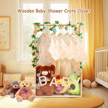 Wood baby shower crate closet with clear front panel, hanging onesies and plush decor