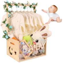 Wood baby shower crate closet with clear front panel and hanging baby clothes