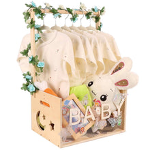 Wood baby shower crate closet with clear front panel, hanging onesies and handle