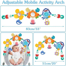 Adjustable mobile activity arch with colorful hanging toys and measurement graphic