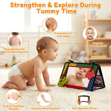Tummy time mirror toy on play surface with black-and-white panels and red teether