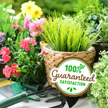 Garden greenery in a planter with tools and a 100% satisfaction badge