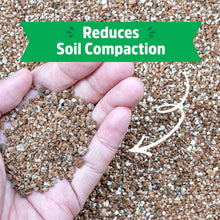 Brown granular vermiculite held in a hand over potting soil