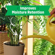 Vermiculite moisture retention with potted grass and a yellow watering can