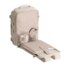 Beige backpack with front mesh organizer pocket and side zip compartments