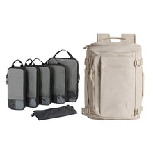 Travel backpack set with compression cubes: dark pouches and light beige backpack