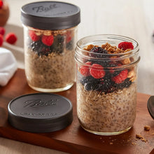 Two wide-mouth mason jars with leakproof lids, one-piece screw-on closure, glass