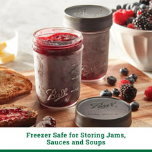 Wide-mouth mason jar with leakproof lid and packaged berries, plus closed lid