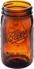 Amber wide-mouth glass mason jar with Ball logo, no lid or band