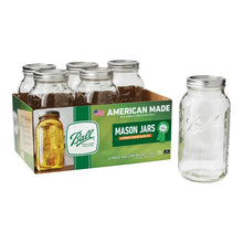 Ball wide-mouth glass mason jar set with metal lids, clear jars with brown contents