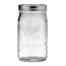 Ball wide-mouth glass mason jar with metal lid and band, clear glass.