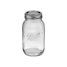 Ball glass quart jar with metal lid and bands