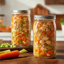 Wide-mouth mason jars filled with chopped vegetables, clear glass jars