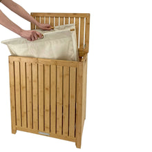Bamboo laundry hamper with white fabric liner lifted open, vertical slatted sides