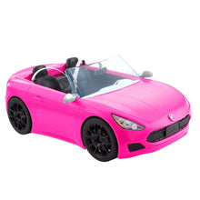 Bright pink convertible toy car with open top, black wheels, and seatbelts