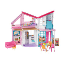 3-story Barbie dollhouse playset with open rooms, furniture, and accessories