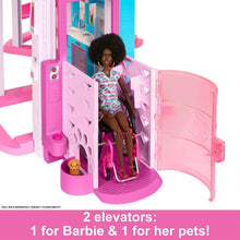 Dollhouse elevator platform with two dolls and a small pet figurine