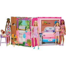 Pink doll house playset with Barbie doll family and outdoor table accessories