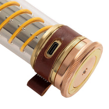 Edison light stick close-up with brown leather strap and gold metal end cap
