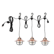 Edison-style pendant string lights set with three copper-glass bulbs and black cords.