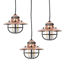 Copper and black Edison-style pendant string lights, three lantern shades