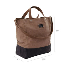 Two-tone canvas tote bag with top handles and front patch logo, taupe and navy