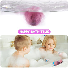 Child bathing with purple bath foam and a bath bomb fizzing in the tub